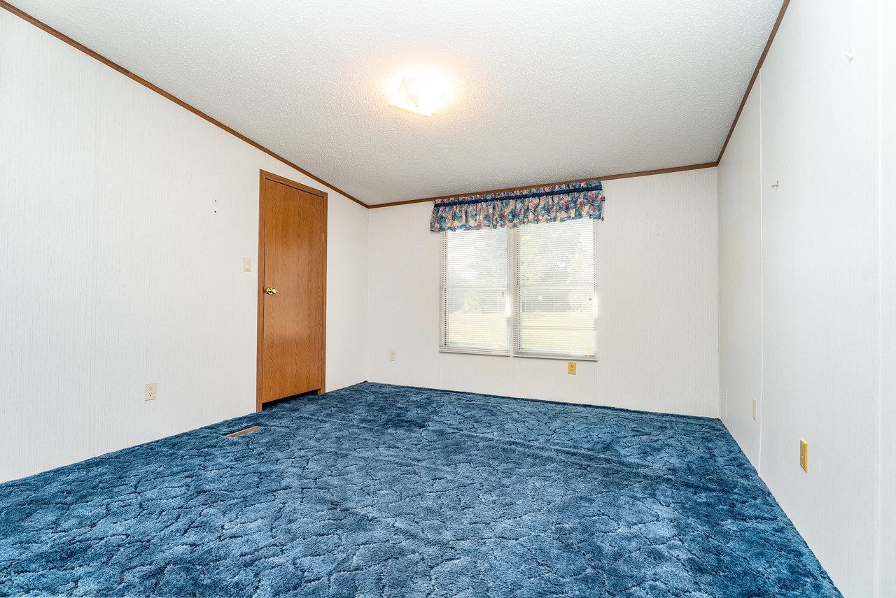 9072 Shultztown Road Linville, VA 22834 - Photo 30 of 51 an empty room with a empty space and window