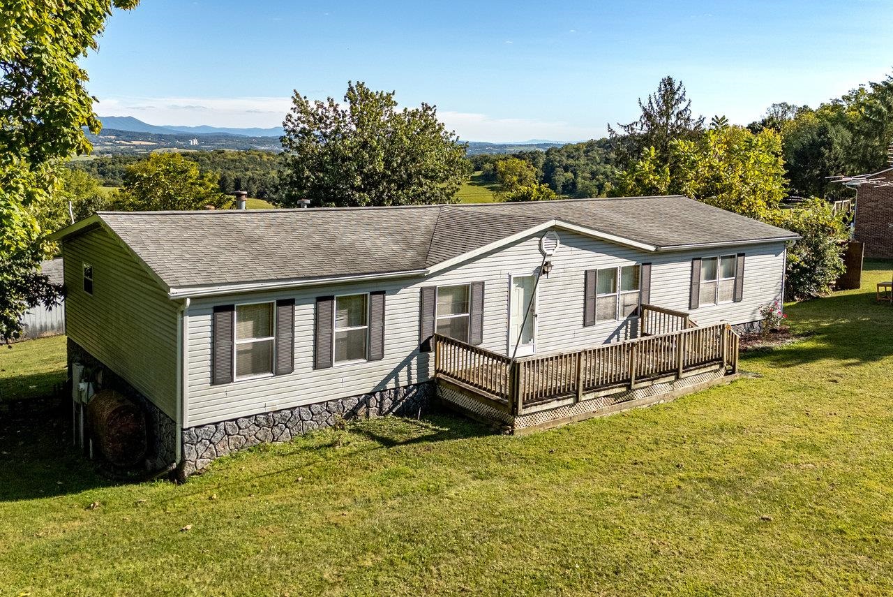 9072 Shultztown Road Linville, VA 22834 - Photo 3 of 51 an aerial view of a house with yard porch and furniture