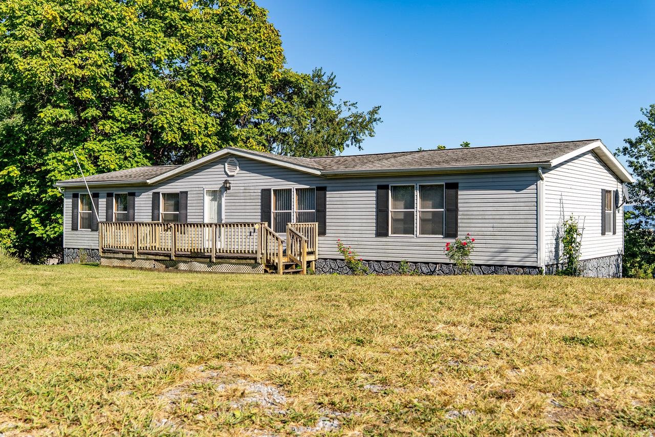 9072 Shultztown Road Linville, VA 22834 - Photo 32 of 51 a front view of a house with a garden
