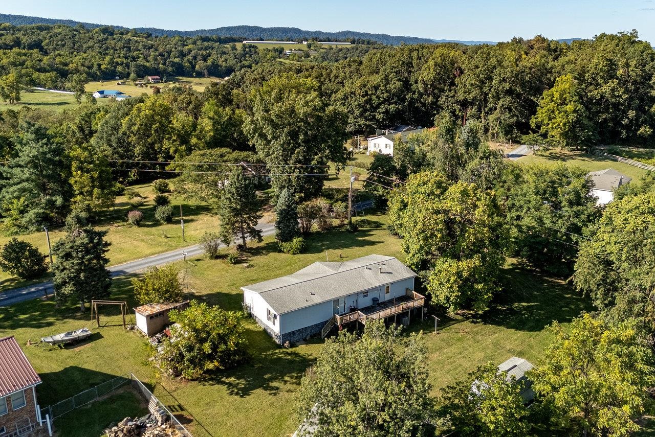 9072 Shultztown Road Linville, VA 22834 - Photo 43 of 51 an aerial view of a house with a yard