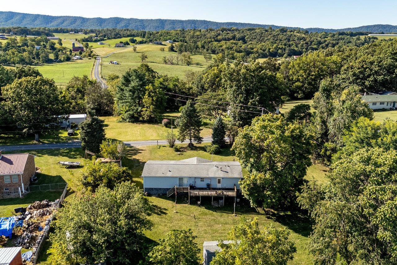 9072 Shultztown Road Linville, VA 22834 - Photo 44 of 51 an aerial view of a house with a lake view