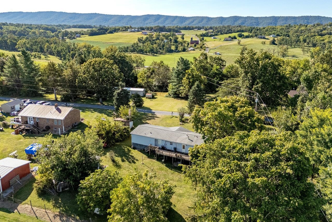 9072 Shultztown Road Linville, VA 22834 - Photo 45 of 51 a view of a lake with a mountain
