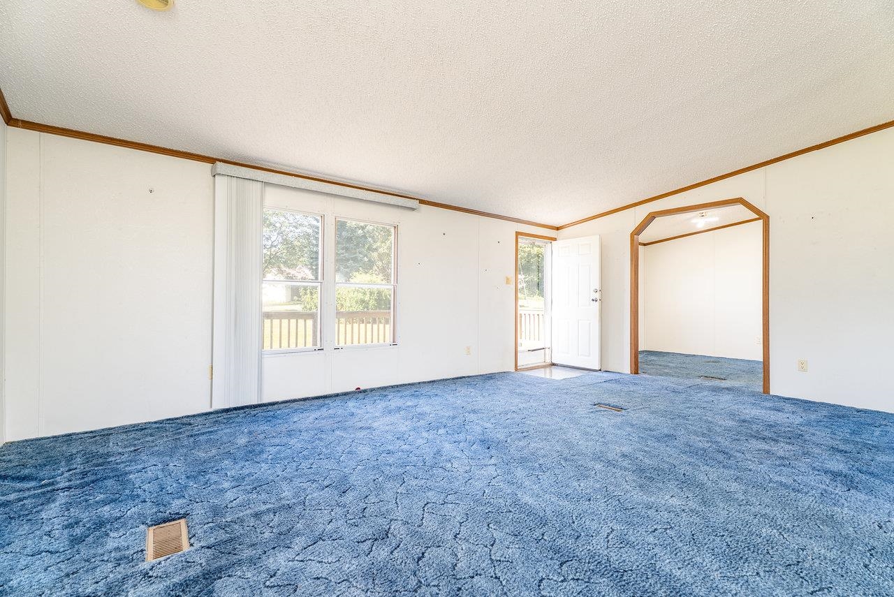 9072 Shultztown Road Linville, VA 22834 - Photo 7 of 51 a view of an empty room with a window