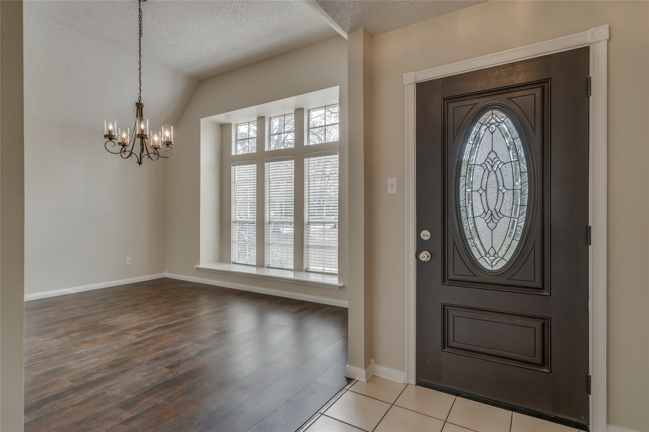 2460 Pebblebrook Circle Conroe, TX 77384 - Photo 4 of 27 Foyer and formal dining room