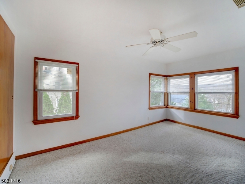 32 Cliffside Trail Denville, NJ 07834 - Photo 13 of 24 a view of an empty room with a window