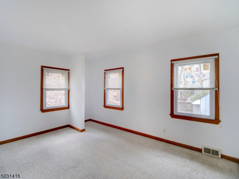 32 Cliffside Trail Denville, NJ 07834 - Photo 15 of 24 a view of an empty room with windows