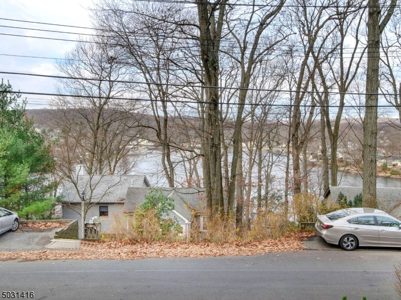 32 Cliffside Trail Denville, NJ 07834 - Photo 2 of 24 a car parked on the side of the road