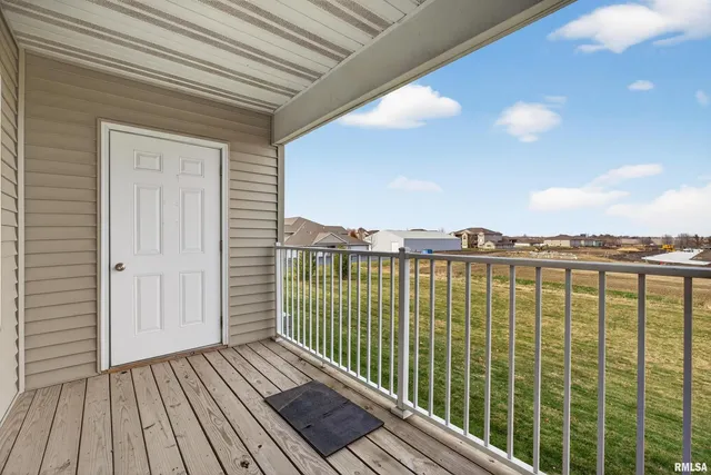 a view of a balcony with city view
