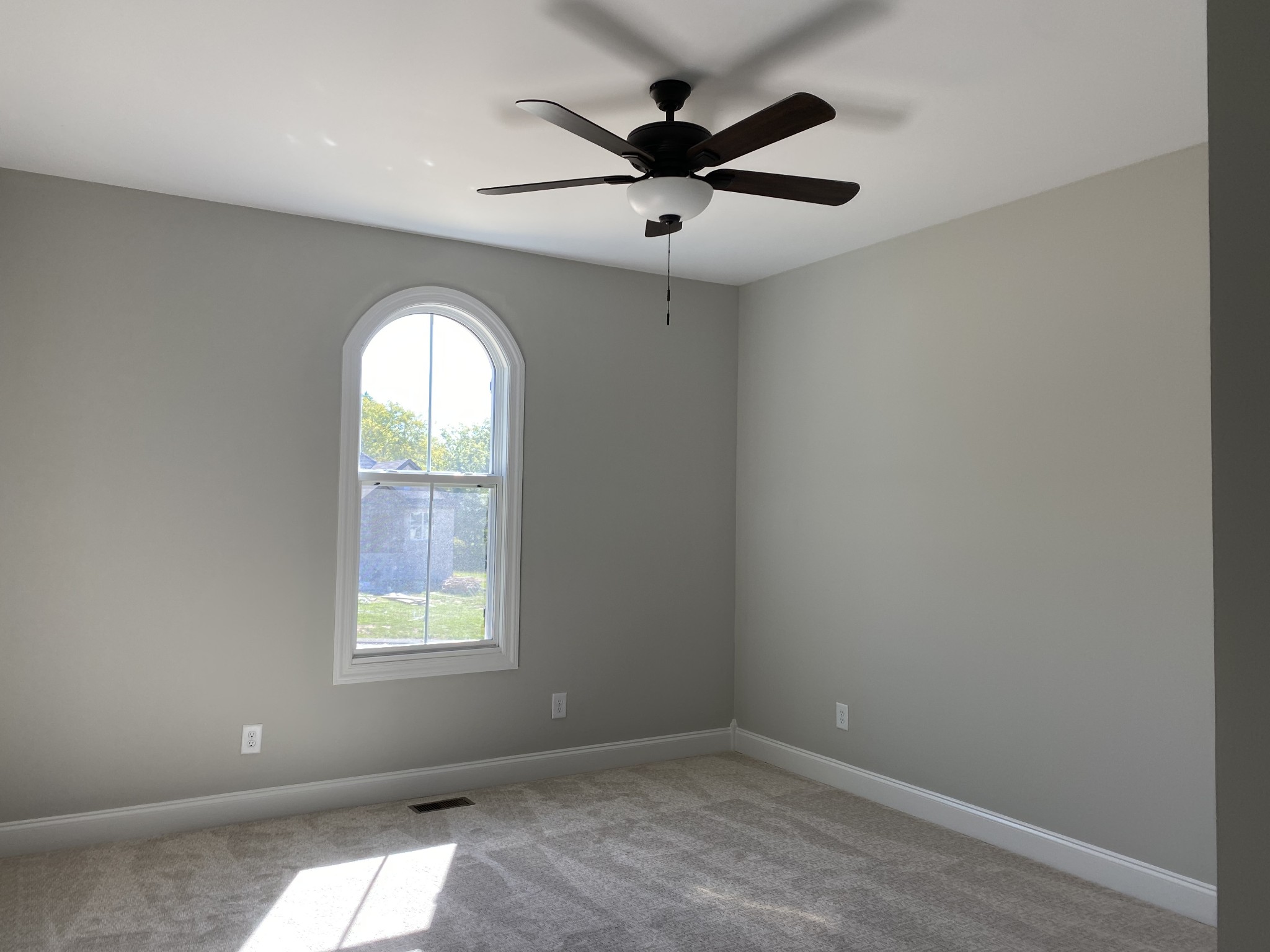 1075 Hideaway Road Columbia, TN 38401 - Photo 11 of 12 an empty room with ceiling fan and windows