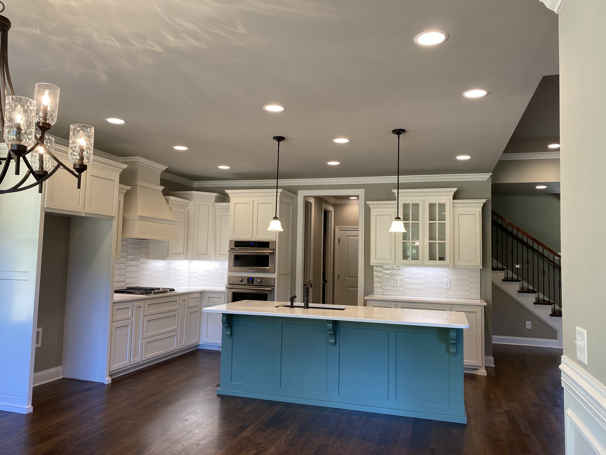 1075 Hideaway Road Columbia, TN 38401 - Photo 4 of 12 a large kitchen with stainless steel appliances kitchen island a large counter top and wooden floors