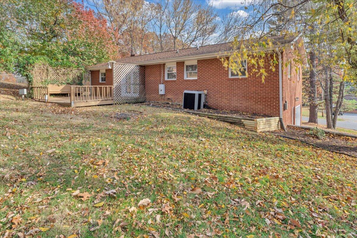 222 Maple Drive Blue Ridge, VA 24064 - Photo 5 of 24 a view of a house with a yard