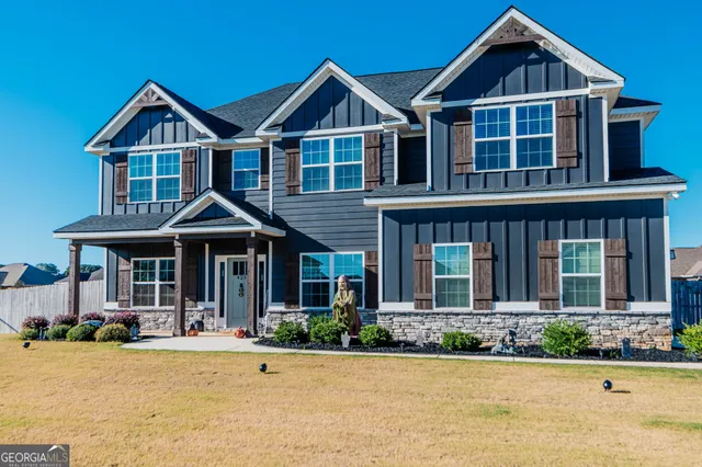 a front view of a house with porch