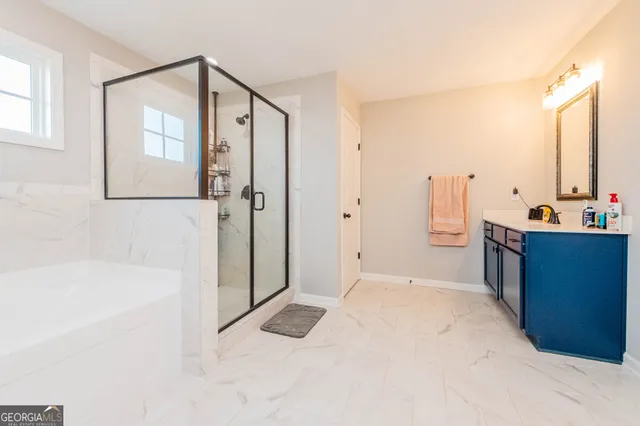 a bed room with a bed and a couch