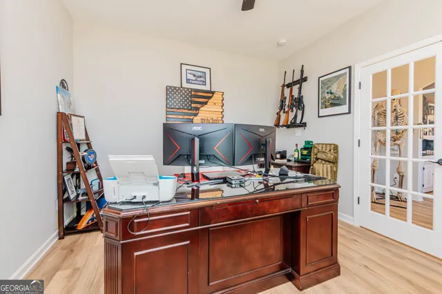 a room with a table and chairs