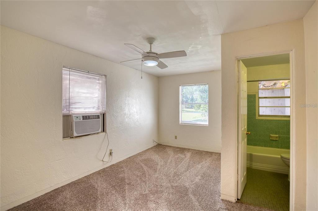 815 8th Street Daytona Beach, FL 32117 - Photo 28 of 50 wooden floor and window in an empty room