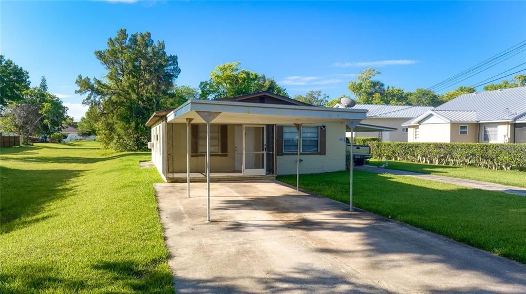 815 8th Street Daytona Beach, FL 32117 - Photo 44 of 50 a view of a house with garden