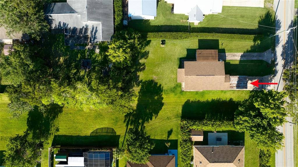 815 8th Street Daytona Beach, FL 32117 - Photo 45 of 50 an aerial view of a house with garden space sitting space and garden