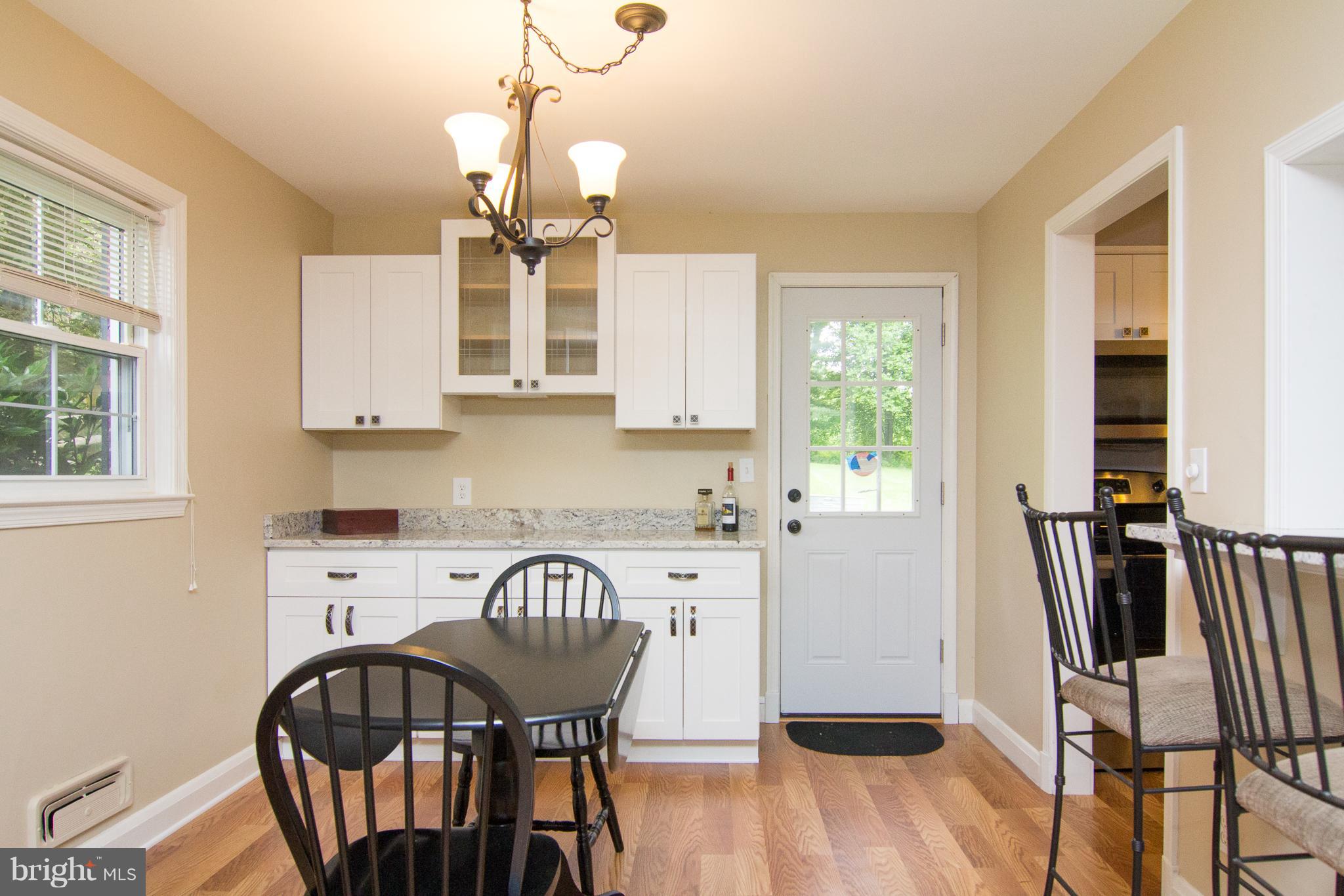 10904 Steffeny Road Randallstown, MD 21133 - Photo 6 of 28 Dining room/Eat in kitchen w/ new breakfast bar!