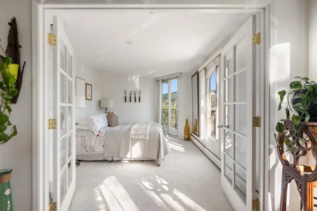 a view of livingroom with furniture and floor to ceiling window
