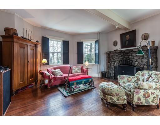 560 Jerusalem Road Cohasset, MA 02025 - Photo 12 of 30 a living room with furniture fireplace and flat screen tv