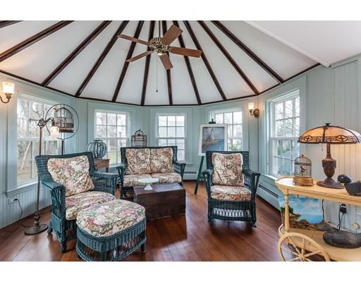 560 Jerusalem Road Cohasset, MA 02025 - Photo 13 of 30 a living room with furniture a table and wooden floor