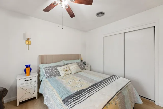 a kitchen with a table chairs a stove a dining table and chairs