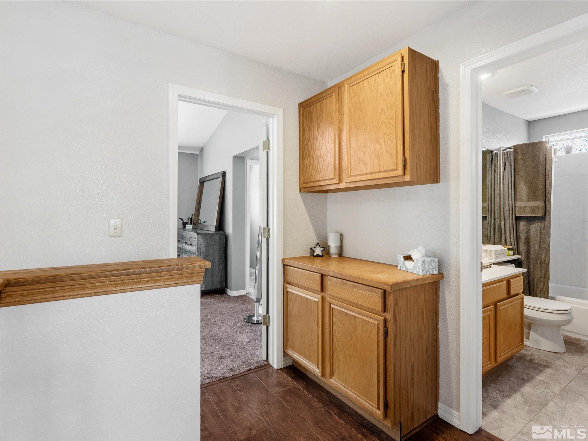 2946 Aspendale Drive Reno, NV 89503 - Photo 25 of 40 a utility room with cabinets washer and dryer
