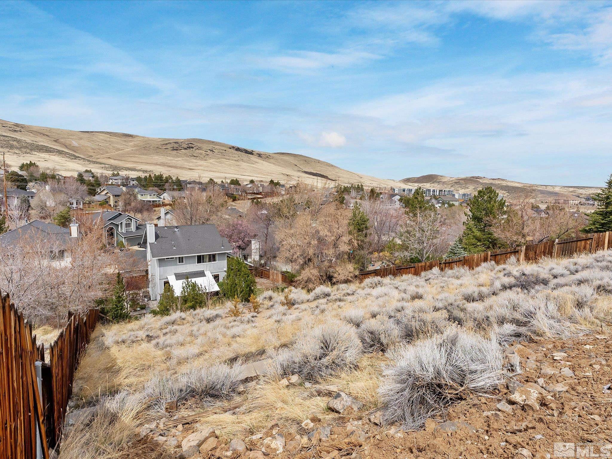 2946 Aspendale Drive Reno, NV 89503 - Photo 39 of 40 a view of a dry yard with mountains in the background