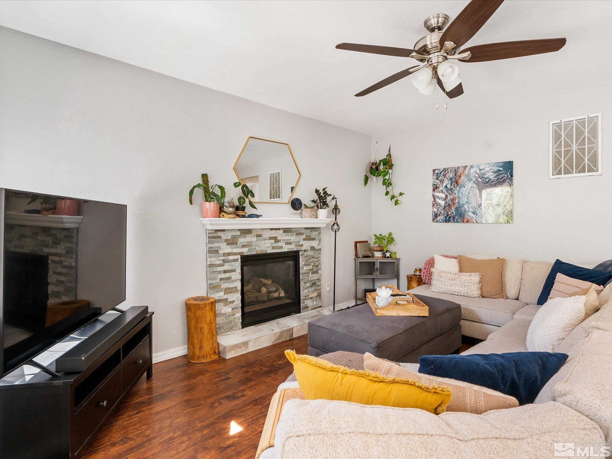 2946 Aspendale Drive Reno, NV 89503 - Photo 7 of 40 a living room with furniture and a fireplace