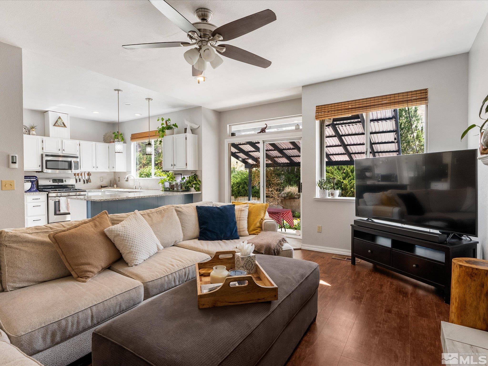 2946 Aspendale Drive Reno, NV 89503 - Photo 8 of 40 a living room with furniture and a flat screen tv