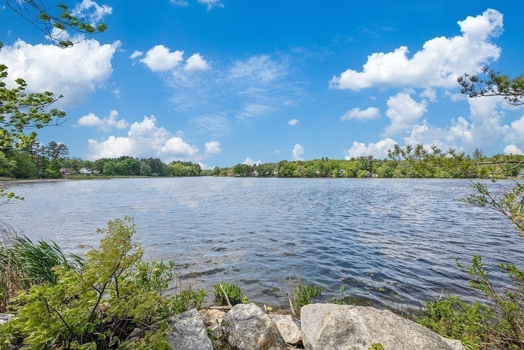 117 Oak Ridge Drive Ayer, MA 01432 - Photo 25 of 26 a view of a lake from a yard
