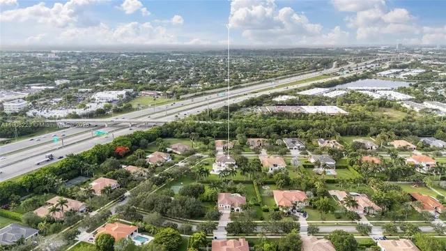 an aerial view of city and lake