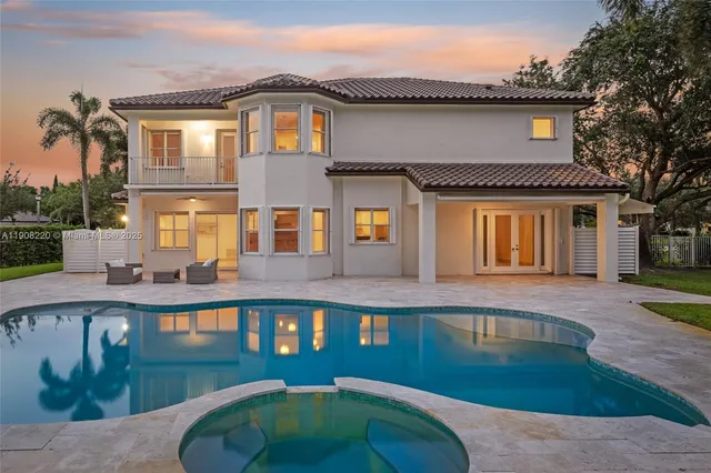 a front view of a house with yard