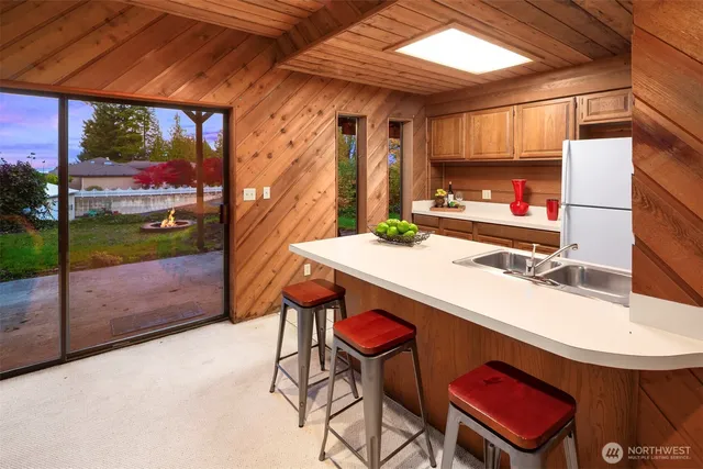 a room with a table and chairs