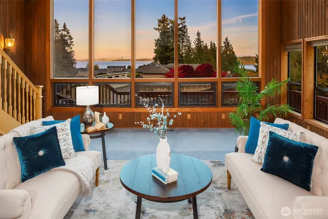 a front view of a house with outdoor seating