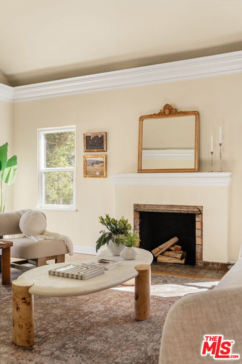 1667 Allen Avenue Pasadena, CA 91104 - Photo 29 of 50 a living room with furniture and a fireplace