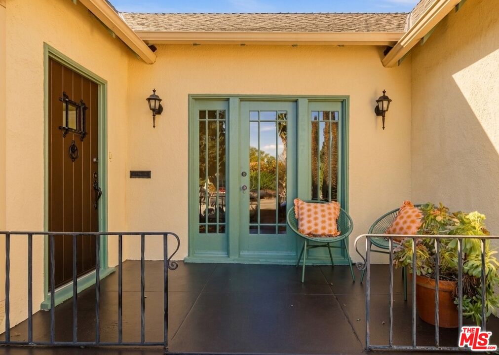 1667 Allen Avenue Pasadena, CA 91104 - Photo 3 of 50 a balcony with hardwood filled with table and chairs