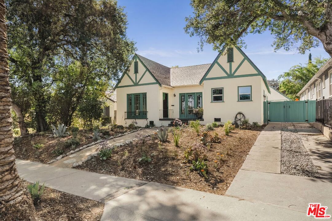 1667 Allen Avenue Pasadena, CA 91104 - Photo 40 of 50 a front view of a house with garden