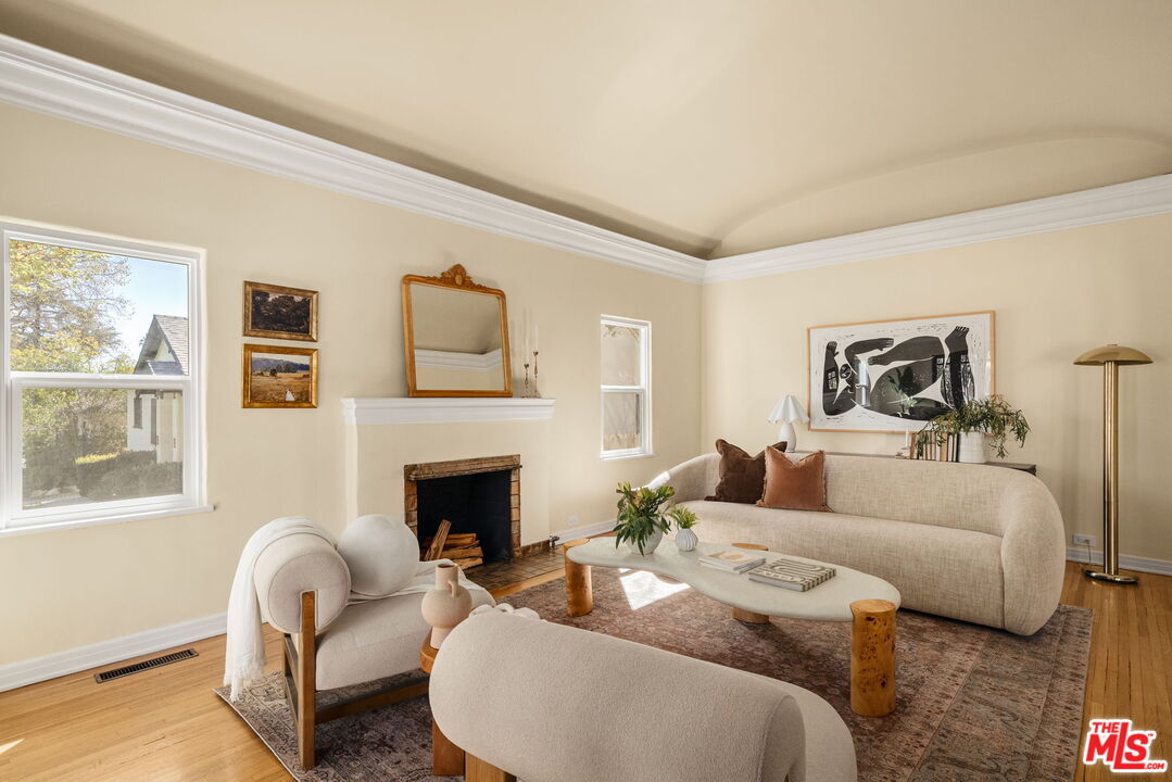 1667 Allen Avenue Pasadena, CA 91104 - Photo 5 of 50 a living room with furniture fireplace and a window