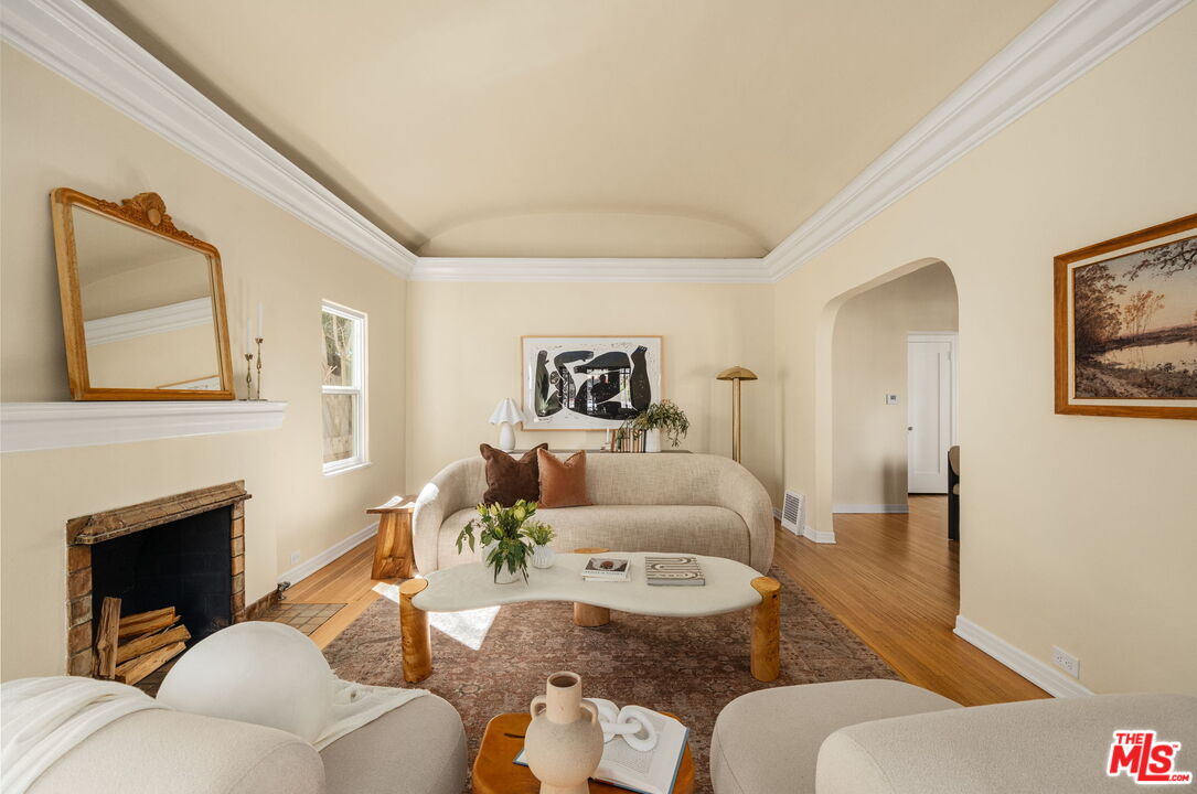 1667 Allen Avenue Pasadena, CA 91104 - Photo 6 of 50 a living room with furniture two couches and a fireplace