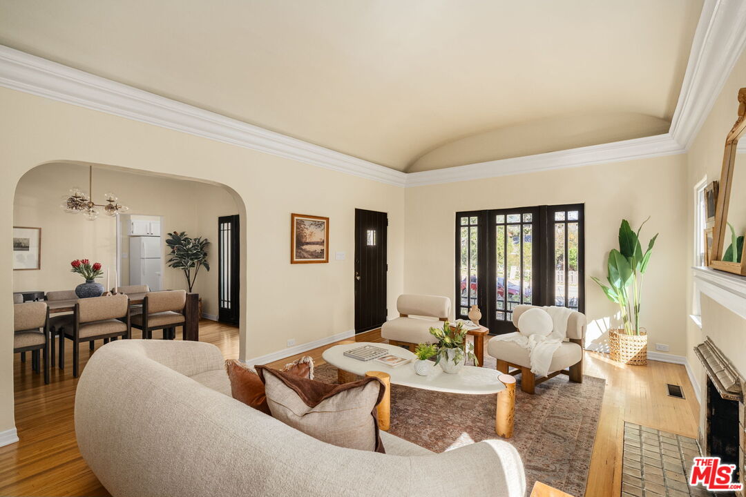 1667 Allen Avenue Pasadena, CA 91104 - Photo 7 of 50 a living room with fireplace furniture and a large window