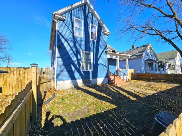 a view of swimming pool with outdoor seating