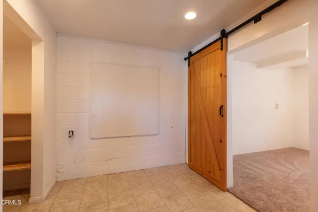 an empty room with closet