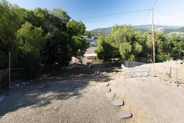a house view with a backyard space
