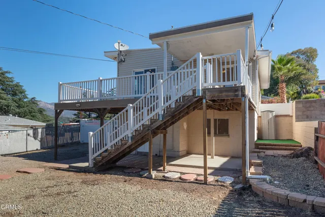 a view of a house with a park