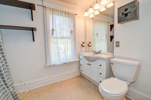 a view of a workspace with furniture