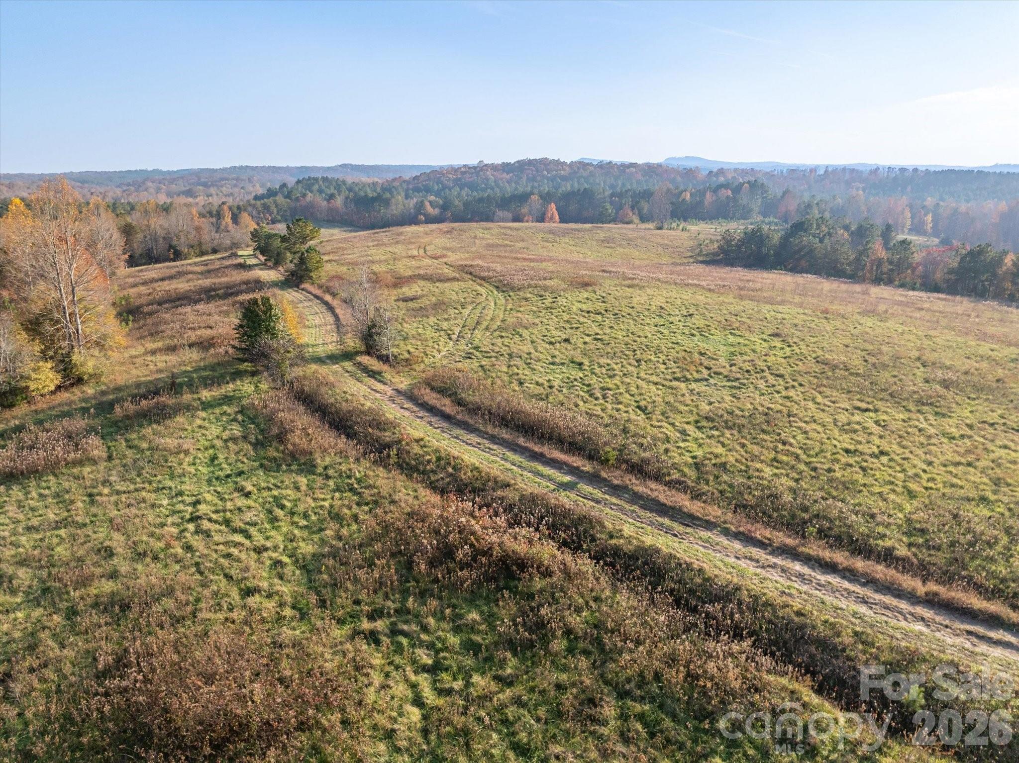 1888 Pea Ridge Road Mill Spring, NC 28756 - Photo 2 of 31 a view of an ocean and mountain