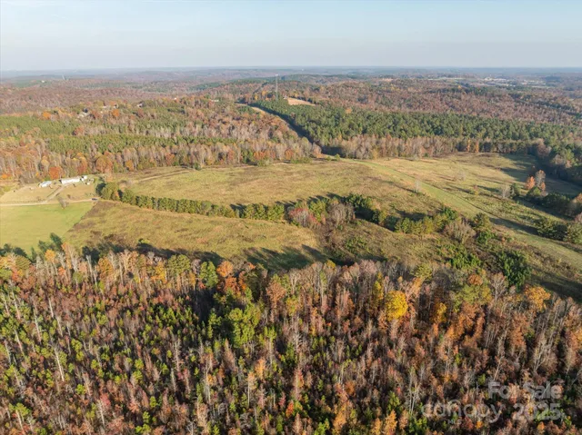 an aerial view of residential building and ocean