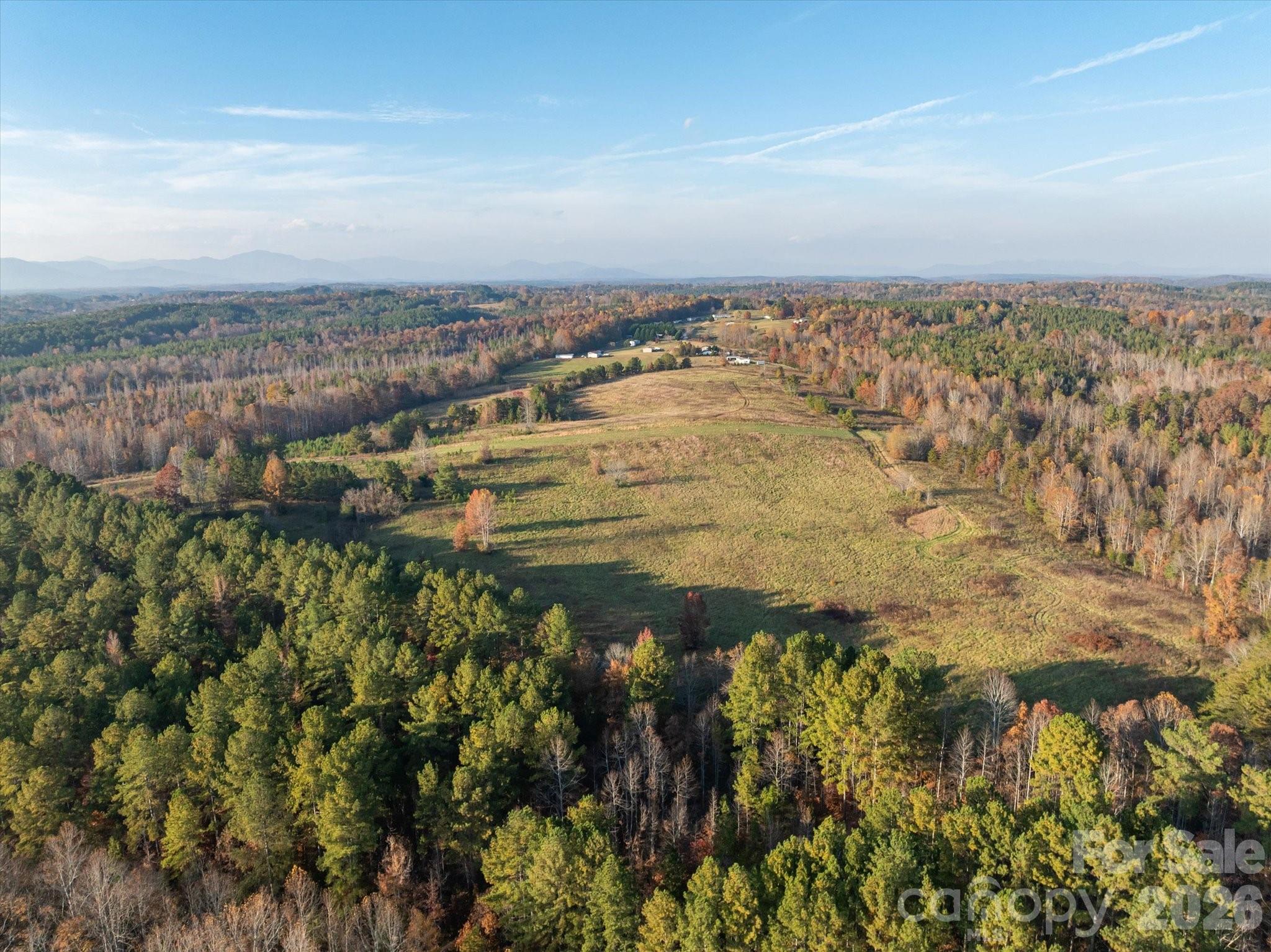 1888 Pea Ridge Road Mill Spring, NC 28756 - Photo 25 of 31 an aerial view of residential building and lake