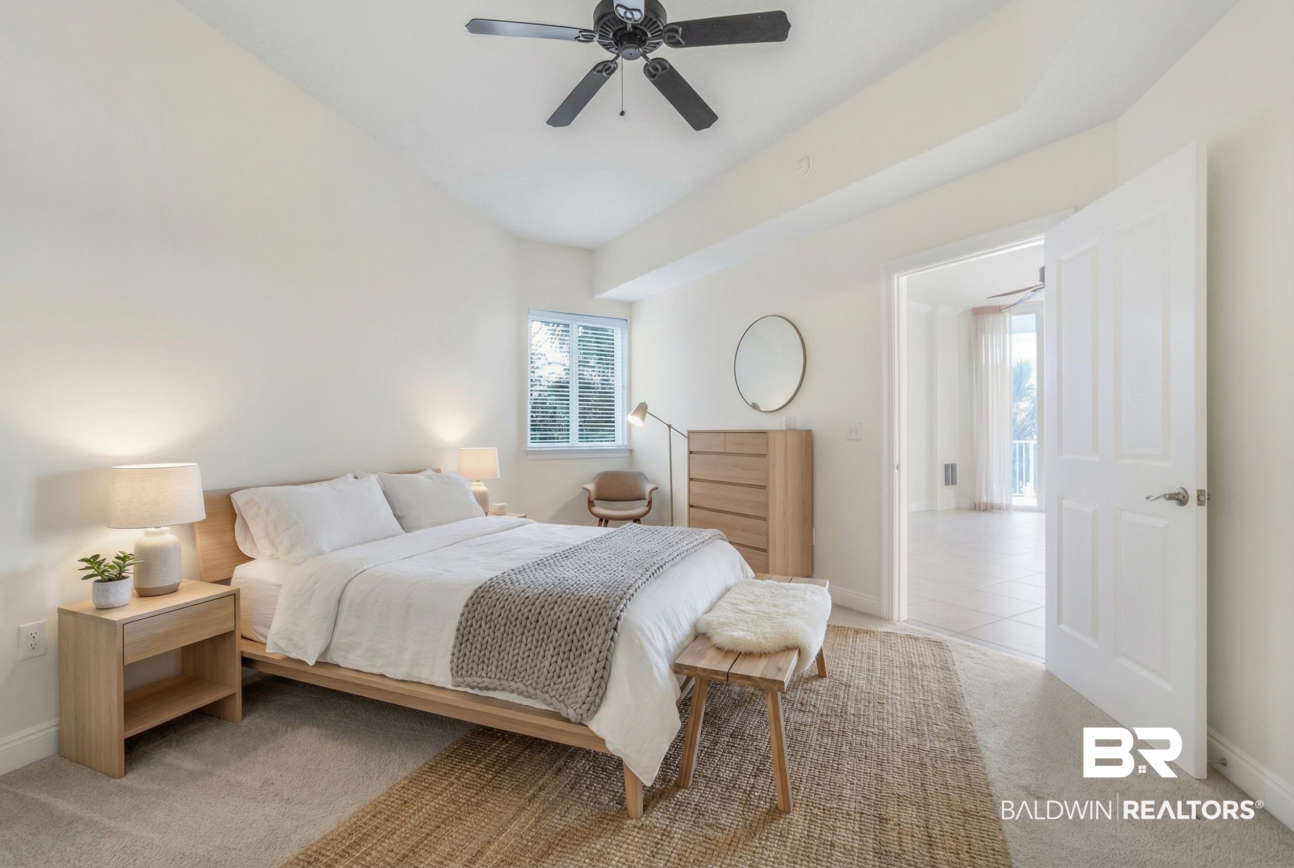 28250 Canal Road, Unit 106 Orange Beach, AL 36561 - Photo 50 of 50 Carpeted bedroom featuring baseboards and ceiling fan